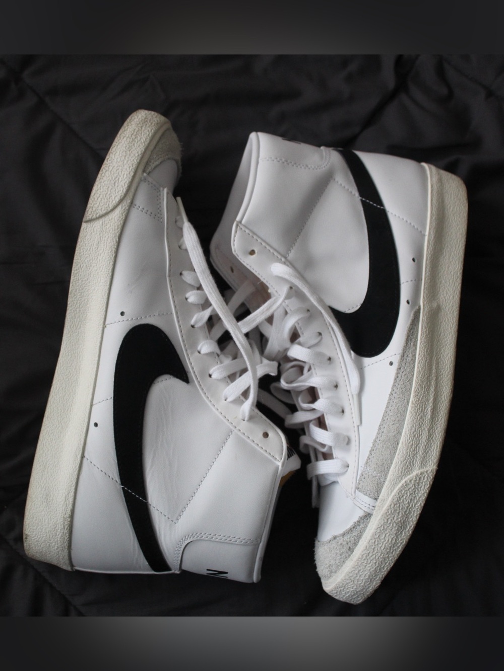 Nike White and Black High-Top Sneakers with Classic Swoosh